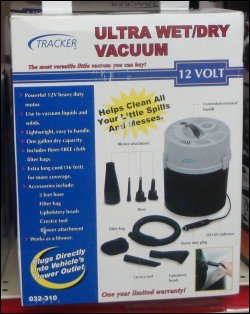 Ultra wet/dry 12-volt vacuum cleaner for sale at a truck stop.