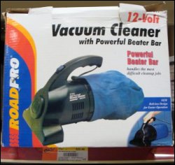 12-volt vacuum cleaner for sale at a truck stop. The box has been roughed up a little.