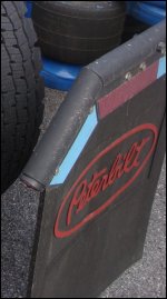 45-degree angle mud flap bracket on tractor.