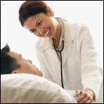 Medical doctor greets a male patient.