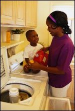 Mom doing laundry.