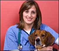 A dog with a veterinarian in charge of the pet's health.