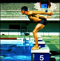 Swimmer waiting to enter pool at the signal.