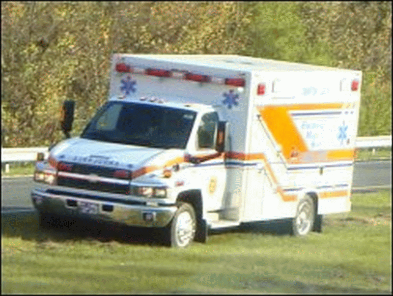 Ambulance on median after accident.