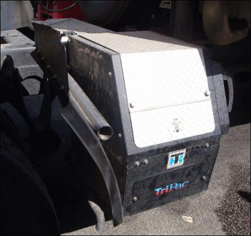 An auxiliary power unit or APU mounted on a commercial motor vehicle.