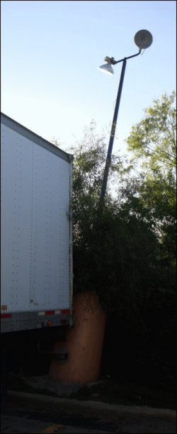 This fuller vertical view shows that the concrete post had a light embedded in it.