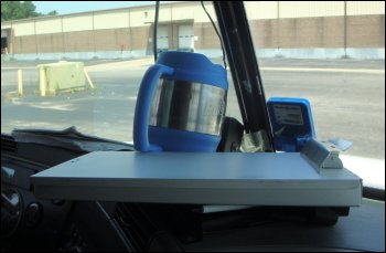 A Bubba Keg on Mike's dash along with his aluminum forms holder.