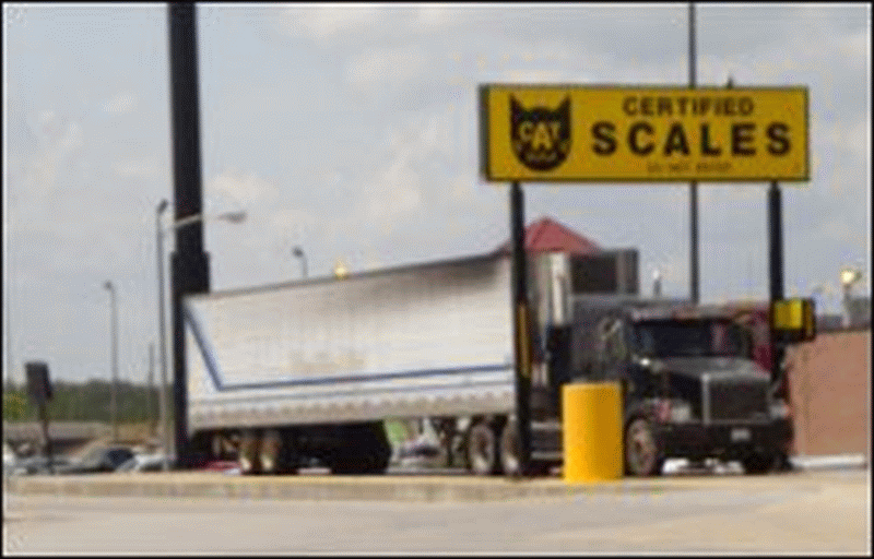 A truck pulled on a CAT scale.