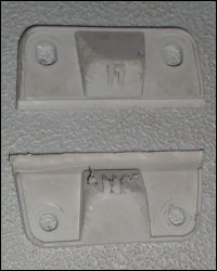 Broken Coleman cooler hinge detached from ice chest.