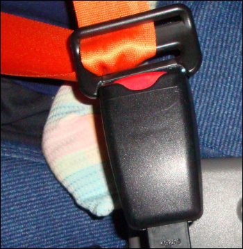 Not only does the seat belt bind on the seat, but it becomes uncomfortable to wear at that angle.