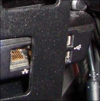 In this even closer photo, you can see the covered USB ports on the right side of our laptop computer. This product would make these ports completely inaccessible.