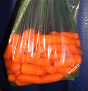 Mini carrots in a Debbie Meyers Green Bag.