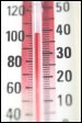 A thermometer showing a temperature of over 100 degrees F.