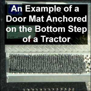 An example of a door mat anchored to the bottom step of a tractor.