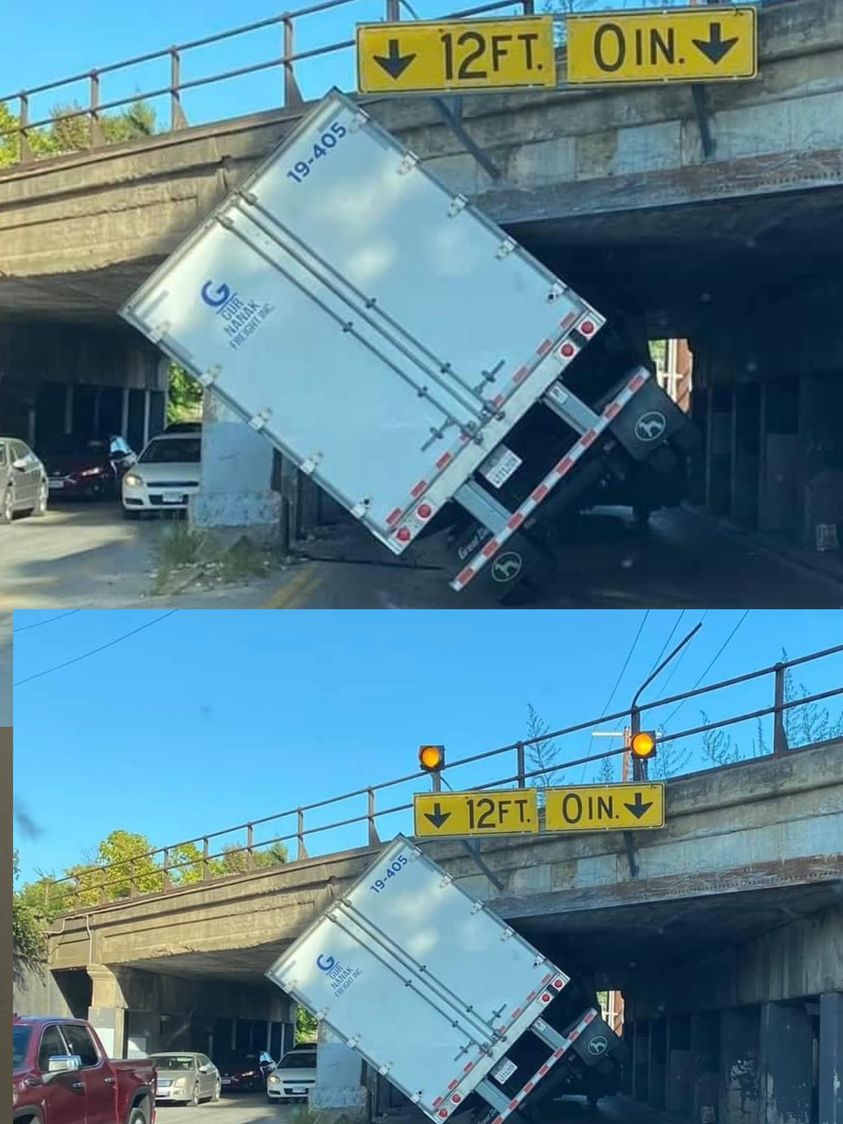 Large truck tries to get under 12-foot clearance bridge.