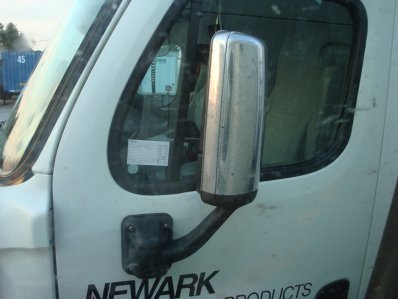 Folding mirror on a truck folded in.