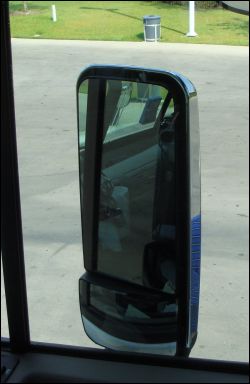 The folding mirror on the passenger side of Mike's truck -- folded in.