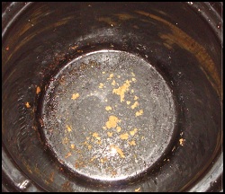 The bottom of the crock pot after the loaf has been loosened and removed.
