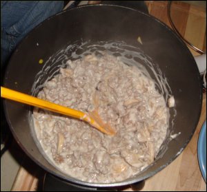 Cooked beef stroganoff using ground beef crumbles.