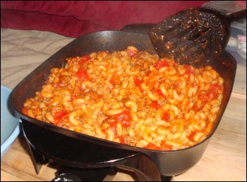 The beefaroni is completely cooked and ready to eat.