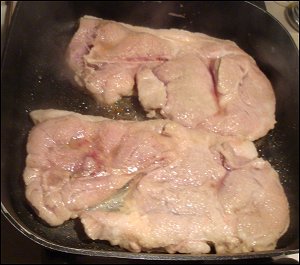 Cooking pork steak.