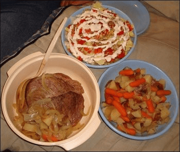 This is a full dinner of pot roast, hot vegetables and salad -- all of it prepared in a semi truck.