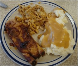 Mashed potatoes with gravy at a truck stop restaurant.