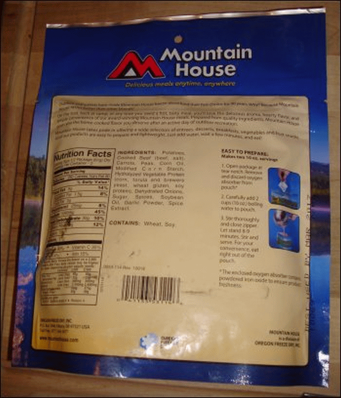 This is a photo of the back panel from a pouch of freeze dried beef stew from Mountain House. It includes the nutrition facts panel, the list of ingredients and the preparation instructions.