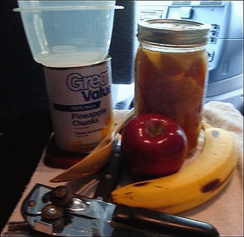 All of the ingredients and equipment Mike used to fix fruit salad.