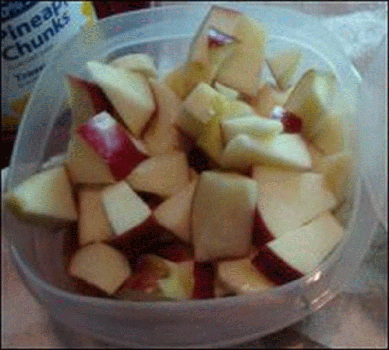 A diced fresh apple was the fourth and final layer of the fruit salad that Mike fixed.