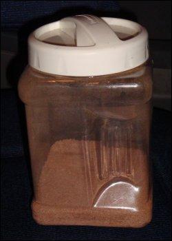 Hot chocolate or hot cocoa mix stored in an airtight container.