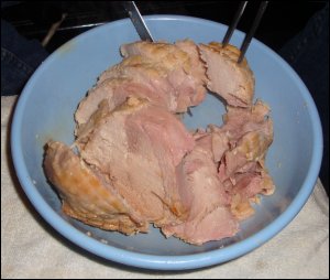 Mike sliced the boneless turkey into portions for Thanksgiving Dinner and turkey leftovers. From one 3-pound piece of meat, we can make three meals for two people (6 servings).