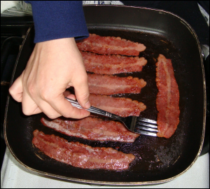 Oscar Mayer turkey bacon after it has been browned to our liking and ready to be removed from the skillet.