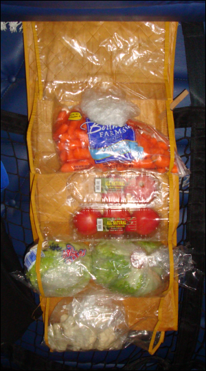 Fresh vegetables stored in an old shoe storage device.