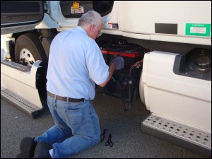 Freightliner trucks moved the battery bank from beneath the catwalk behind the cab to behind and below the driver's seat.