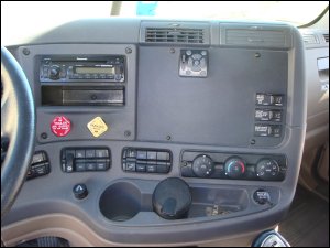 The dash in the Cascadia was re-designed with very little storage space and a deep well down toward the windshield.