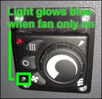 The bunk heater control panel glows a bright blue when the vent is on.
