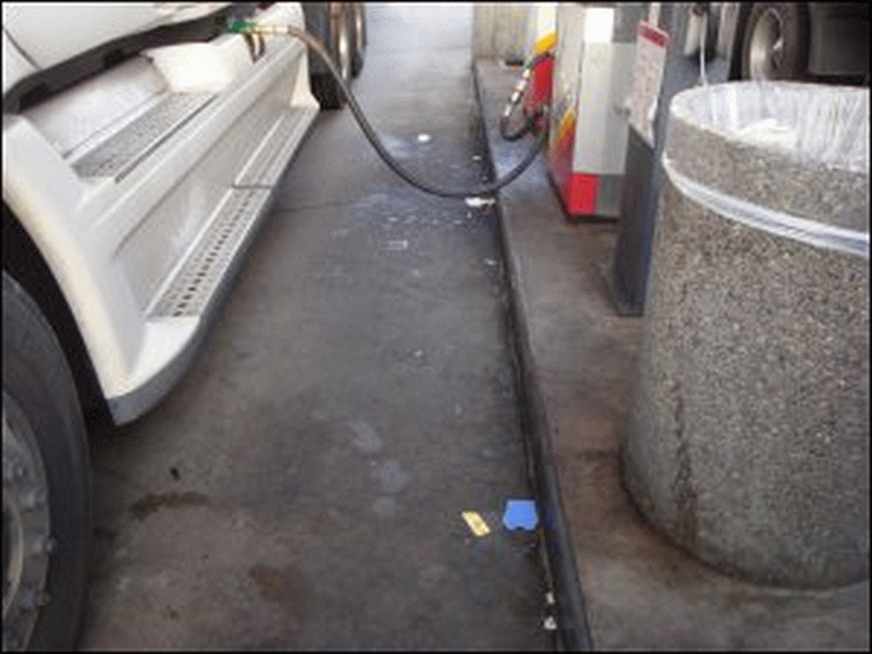 The trash on the ground in the fuel bay at the Flying J in Carlisle, PA, on August 30, 2010.