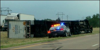 Close-up of an overturned truck resulted from driving in wind, strong winds, in Nebraska when a tornado alert had been posted in the area.