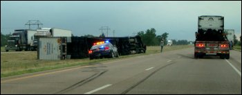 An overturned truck resulted from driving in wind, strong winds, in Nebraska when a tornado alert had been posted in the area.