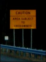 This is a close-up of one of the road signs warning about the area being subject to crosswinds.