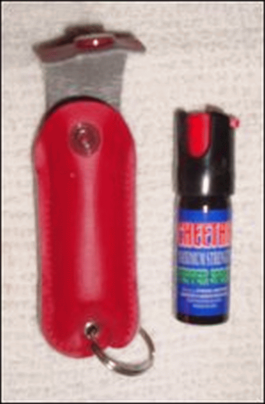 Pepper spray cartridge with holder.