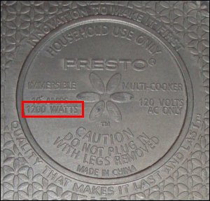 The embossed information on the bottom of the Presto Kitchen Kettle, with an emphasis on the fact that this appliance uses 1200 watts.