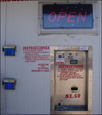 The front of an Ice House America building where the instructions and payment for ice goes.