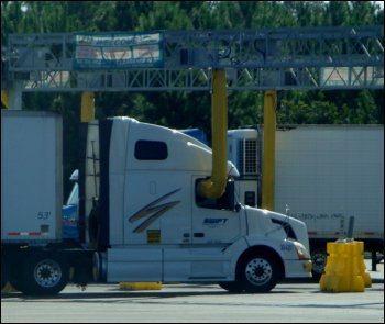 A truck with this service's anti-idling connection.