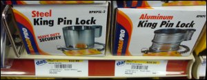 Steel and cast aluminum king pin locks are usually sold side by side in truck stops.