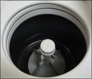 The basket of the Speed Queen coin-operated washing machine.