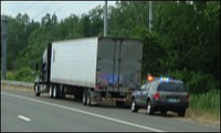 Law enforcement has pulled over a professional truck driver.