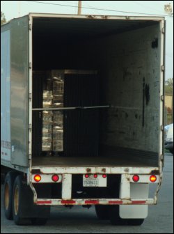 A load in the back of a trailer with a loadlock securing it.