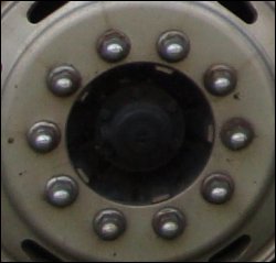 The lug nut covers on Mike's tractor's driver side steer wheel.